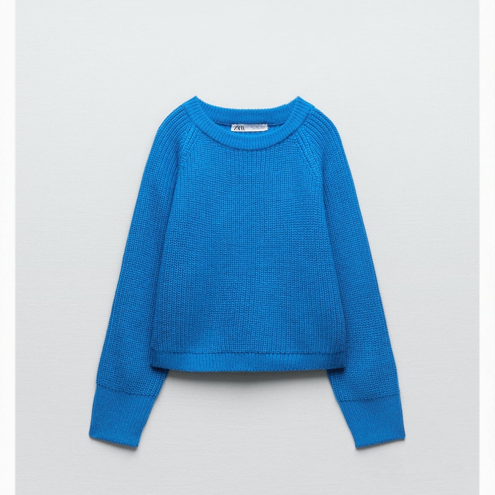 Blue knitted sweater